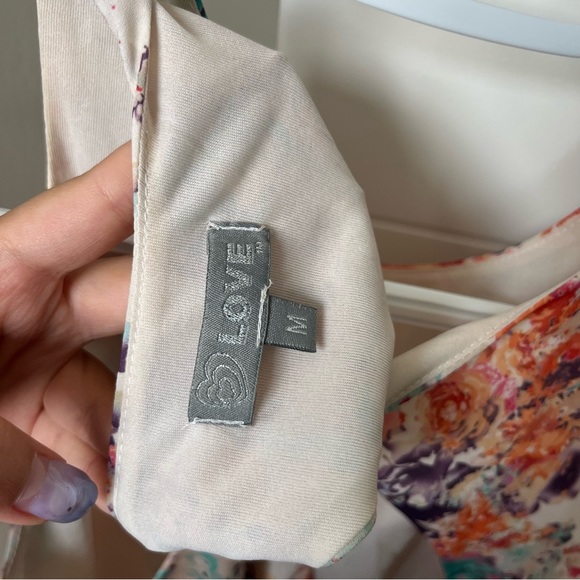 Flower romper with an open back - Picture 3 of 4